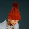 Powder Cosy Bobble Hat In Rust Loungewear And Accessories